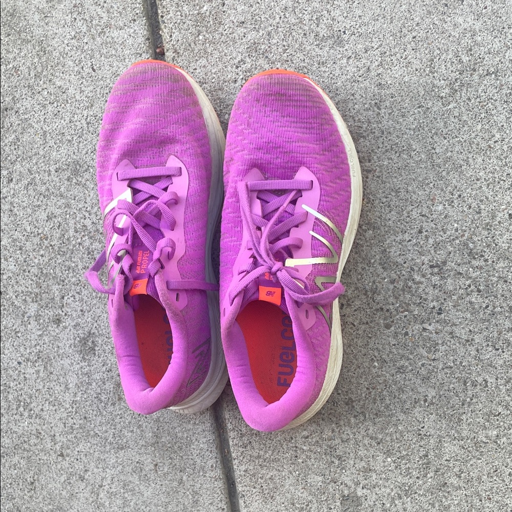 New Balance Women's Purple Athletic Running Shoes with Orange Accents